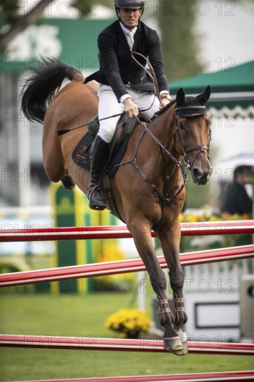 Kristaps Neretnieks of Austria, riding Valour competes in the 2025 Spruce Meadows Masters on