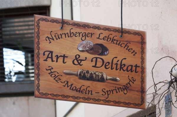 Nose sign at a shop for gingerbread and baking accessories, Trödelmarkt 45, Nuremberg, Central