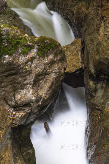 Pouring water in the gorge, trapped rock boulder, Schrattenkalk, Breitachklamm, Oberstdorf, Allgäu