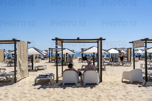 Kilometre-long beach Praia da Ilha de Tavira, on the island off Tavira, partly managed, facilities