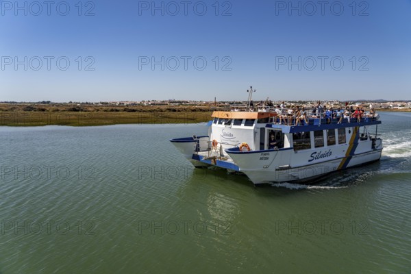 Ride on the Silnido ferry from Tavira on the Gilão River to the beach Praia da Ilha de Tavira, on