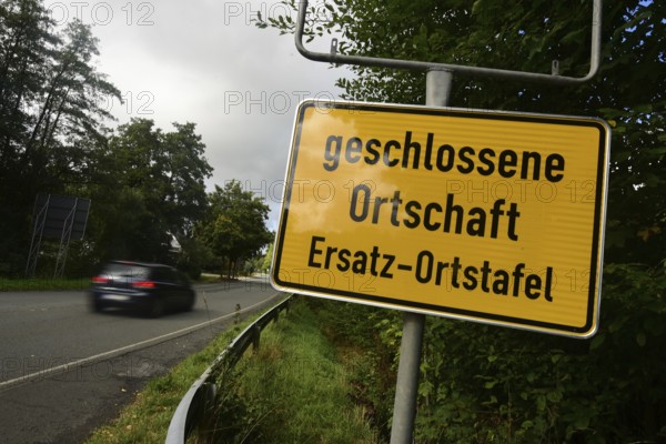 Instead of the usual place name sign, a replacement place name sign has been installed in the