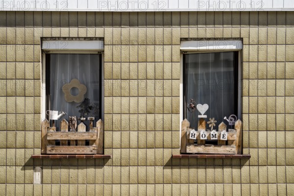 Monoton tiled house facade with decorated windows, Zierenberg, district of Kassel, Hesse, Germany