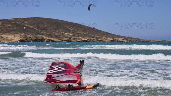 Windsurfer on the water with vivid colours and clear sky, Prasonisi, beach, surf, windsurfer, kite