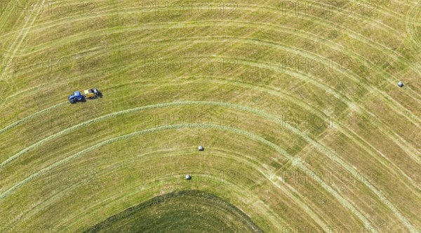 Aerial view, agricultural fields, tractor mowing meadow, Langenholthausen, Balve, Sauerland, North