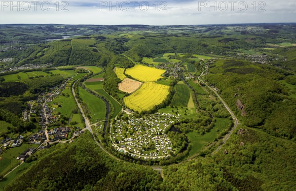 Rurschleife with camping site, agricultural fields and rape fields near Heimbach, Heimbach, Eifel,