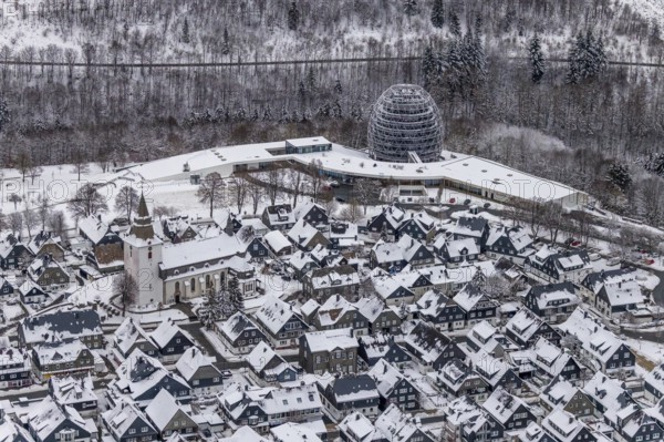 Aerial view of the snowy winter landscape of Winterberg with deserted streets during the corona