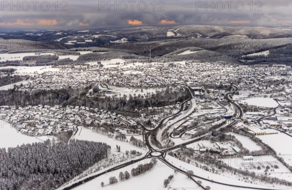 Aerial view of the snowy winter landscape of Winterberg with deserted streets during the corona