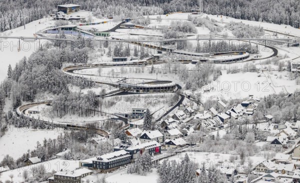 Aerial view of the snowy winter landscape of Winterberg with the VELTINS-EisArena Winterberg