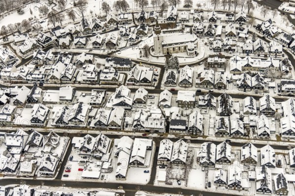 Aerial view of the snowy winter landscape of Winterberg with deserted streets during the Corona