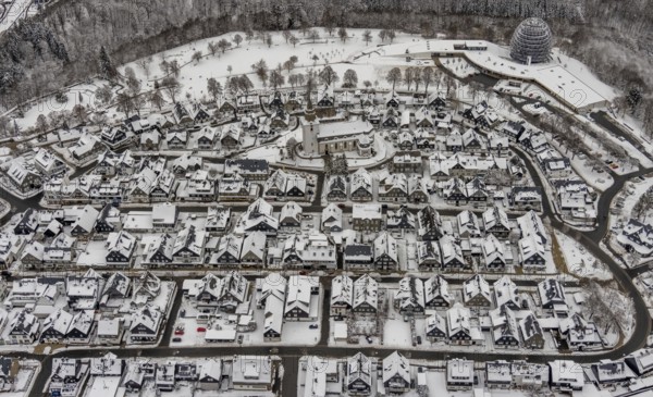Aerial view of the snowy winter landscape of Winterberg with deserted streets during the Corona