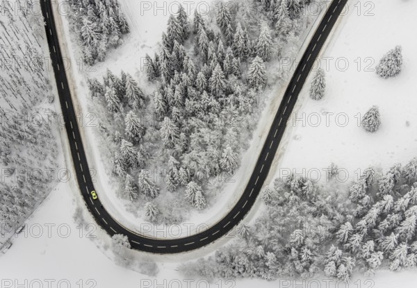 Aerial view of the snowy winter landscape of Winterberg with winding roads and paths in the