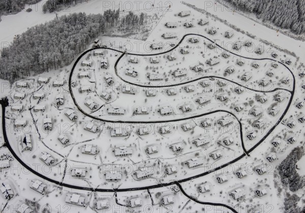 Aerial view of the snowy winter landscape of Winterberg with the deserted Landal Winterberg holiday