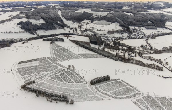 Aerial view of the snowy winter landscape of Winterberg in Sauerland in North Rhine-Westphalia,