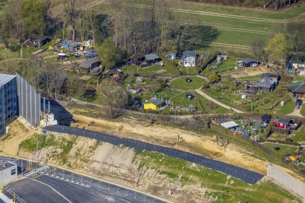 Aerial view, allotment garden site Mellmausland next to the Amazon site on the industrial estate on