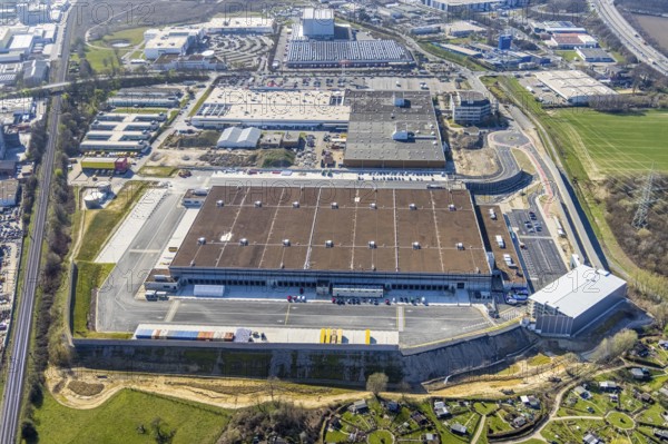 Aerial view, construction site new building Amazon logistics centre, industrial estate on