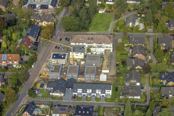 Aerial view, construction site with new construction of residential buildings on the site of the