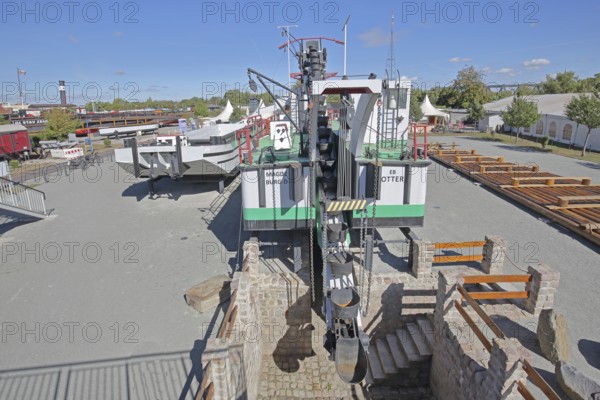 Historic dredging ship 'Otter' with shovels for dredging, open-air museum, machine, view from