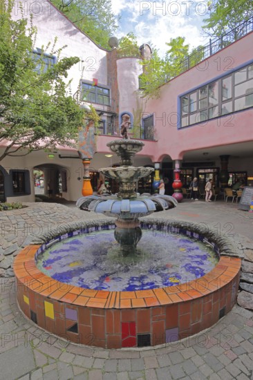 Fountain in the inner courtyard, Green Citadel, Hundertwasser House, mosaic, Magdeburg,