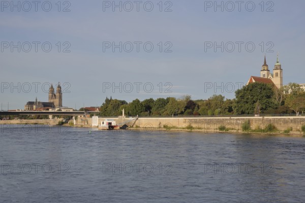 Cityscape with Gothic cathedral, New River Bridge and late Romanesque St. Johannis Church, church