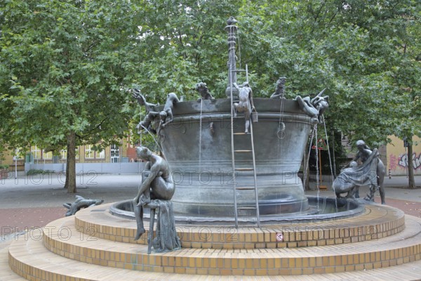 Faun Fountain by Heinrich Apel 1986, modern art, bronze sculptures, figures, rung ladder, high,