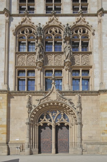 Portal with decorations and figures from the historic labour court, courthouse, entrance,