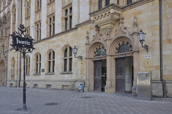 Portal of the historic labour court with sign for justice, court building, inscription, entrance