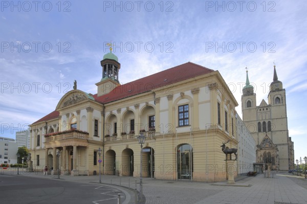 Baroque Old Town Hall built in 1713, stag column with stag statue and late Romanesque St. Johannis