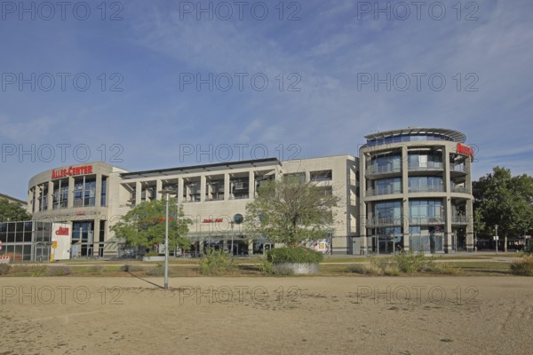 Allee-Center with flags, shopping centre, modern building, glass building, Magdeburg,