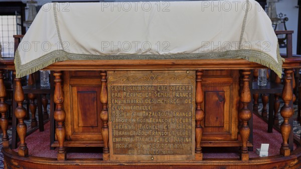 Ornate wooden construction with historical inscription, Kahal Shalom Synagogue, Sephardic