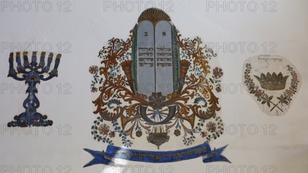 Ornate symbols and scrolls, classical colour palette, Kahal Shalom Synagogue, Sephardic Synagogue,