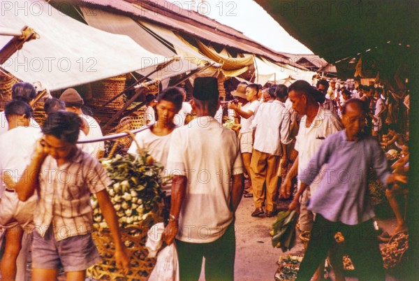 Porters with vegetables people shopping at the old market, Johor Bahru, Johor, Malaya, Malaysia,