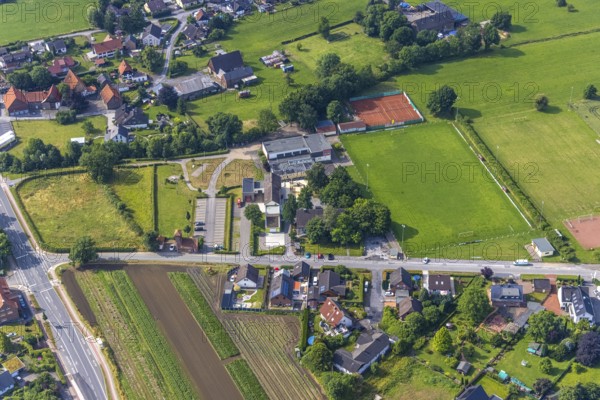Aerial photo, Carl-Orff school, volunteer fire brigade, sports field SV Hilbeck, Hilbeck, Werl,
