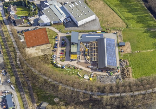 Aerial view, construction site and new building veterinary practice for horses and small animals in