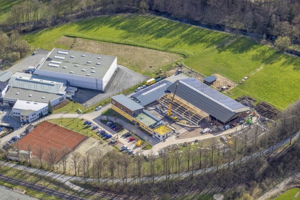 Aerial view, construction site and new building veterinary practice for horses and small animals in