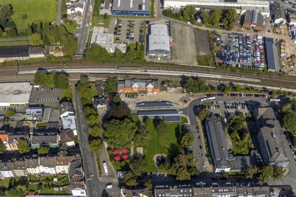Aerial view, Schwelm railway station with red station building and bus station with solar roof and