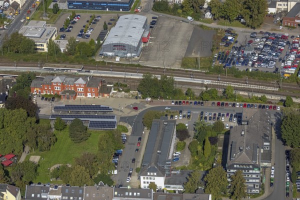 Aerial view, Schwelm railway station with red station building and bus station with solar roof and