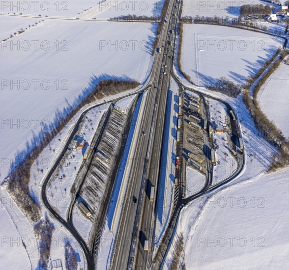 Aerial photo, Ostönner Grund rest area on the A44 motorway, snow, winter, rest areas, trucks,