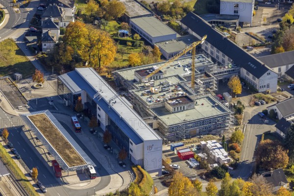 Aerial view, bus station and construction work at the vocational college Olsberg of the HSK in