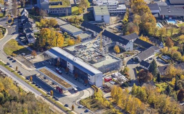 Aerial view, bus station and construction work at the vocational college Olsberg of the HSK in