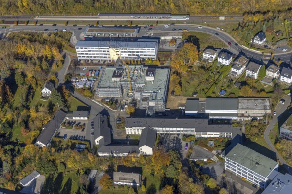 Aerial view, bus station and construction work at the vocational college Olsberg of the HSK in