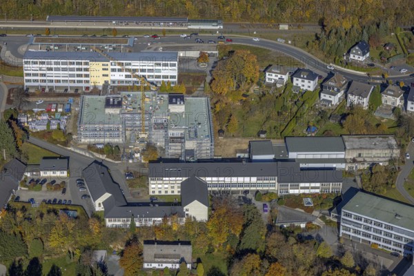 Aerial view, bus station and construction work at the vocational college Olsberg of the HSK in
