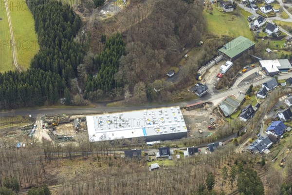 Aerial view, new construction of a factory building, sawmill Schrage, Neuenkleusheim, Olpe,