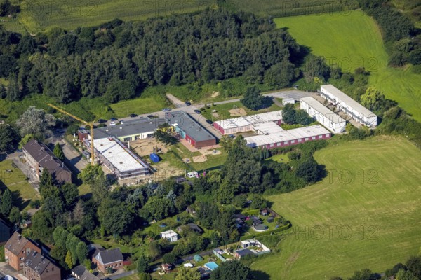 Aerial view, construction site and new building at the municip. Day care centre Holten in
