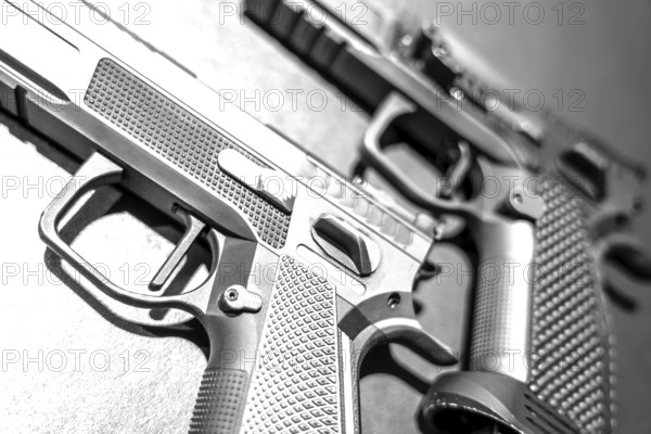 Modern Elegant Sport Handgun For IPSC and IPDA on Grey Background in Switzerland