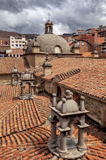 View of the interlocking roofs of a church with the surrounding town, San Fransisco Cathedral in La
