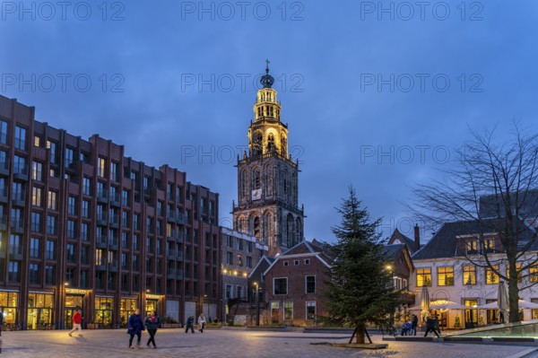 New Market and the Martinitoren church tower or Martinikerk church tower at dusk, Groningen,