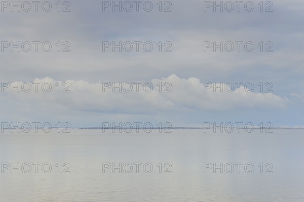North Sea coast, special light mood over the Wadden Sea with rising water and calm wind, on the