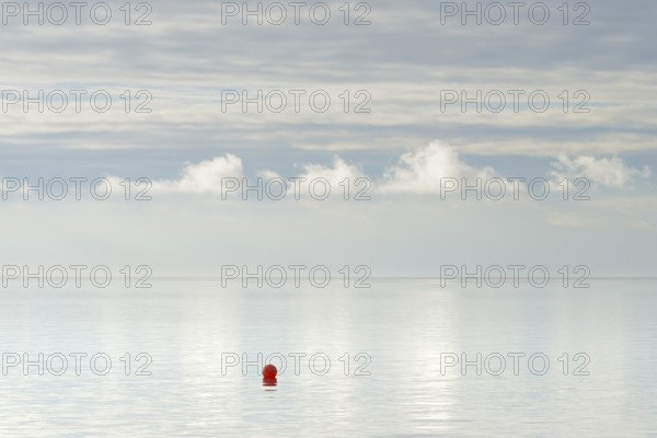 North Sea coast, special light atmosphere over the Wadden Sea with rising water and calm wind, red