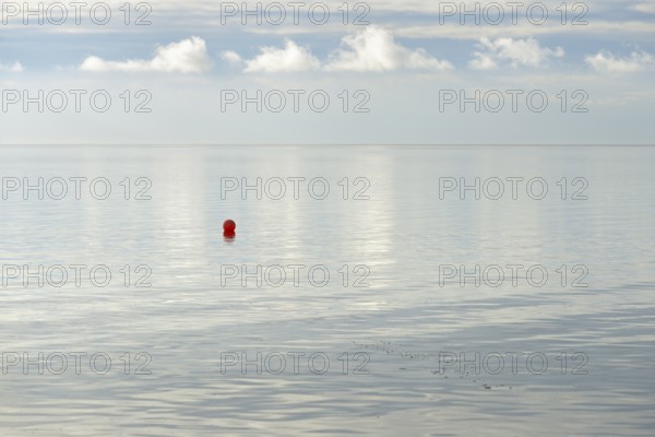 North Sea coast, special light atmosphere over the Wadden Sea with rising water and calm wind, red